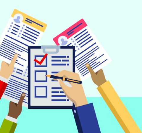 hands filling out job applications