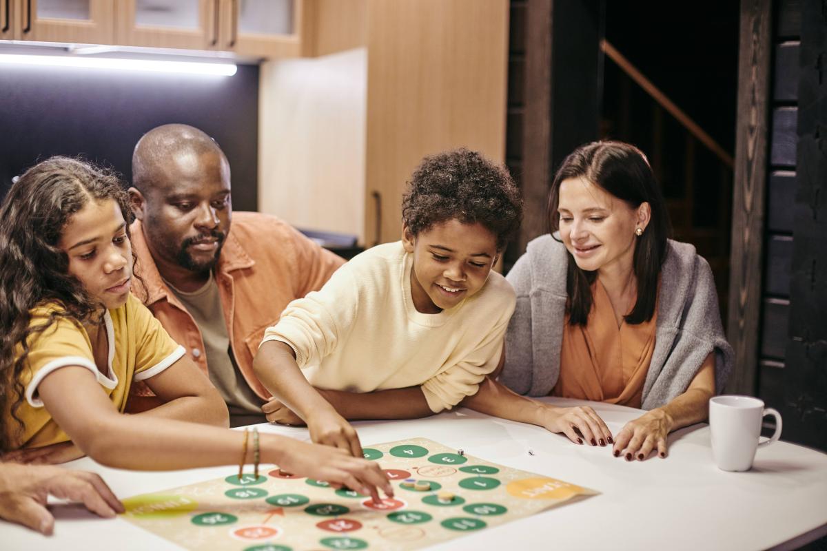 Family playing board game